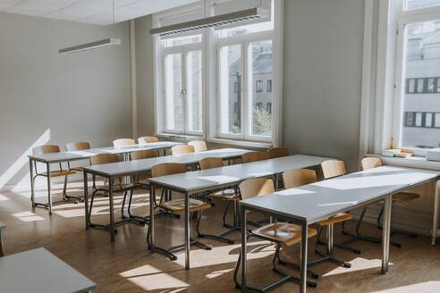 Empty classroom with chairs and desks at school - MASF40092