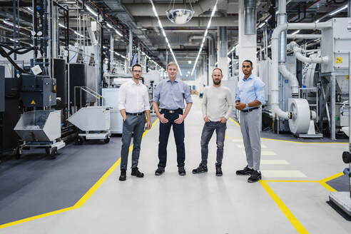 Portrait of confident staff in a factory - DIGF20757