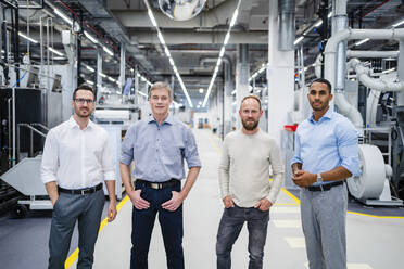 Portrait of confident staff in a factory - DIGF20758