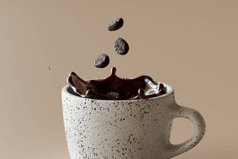 3D-Rendering von Kaffeebohnen, die in eine Tasse Kaffee fallen - GCAF00433