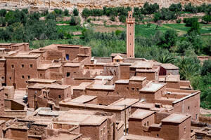 Ancient buildings of a Berber village framed by palm tree groves, Ounila Valley, Atlas mountains, Ouarzazate province, Morocco, North Africa, Africa - RHPLF28500