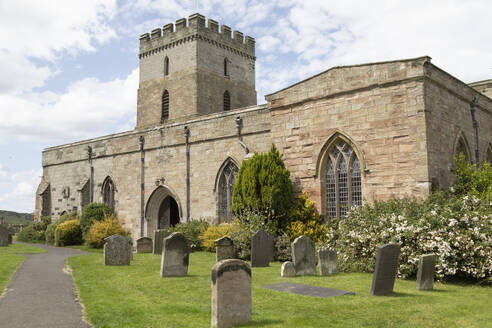 St. Aidan's Church, a 12th century place of worship, a key location in spreading Christianity during the Anglo-Saxon era, and its churchyard, Bamburgh, Northumberland, England, United Kingdom, Europe - RHPLF28647