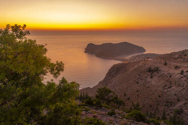 View of Assos, coastline, sea and hills at sunset, Kefalonia, Ionian Islands, Greek Islands, Greece, Europe - RHPLF28726