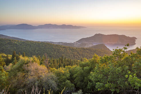 View of Assos, coastline, sea and hills at sunset, Kefalonia, Ionian Islands, Greek Islands, Greece, Europe - RHPLF28728