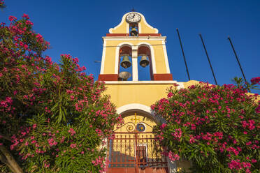 View of church bell tower overlooking Fiscardo harbour, Fiscardo, Kefalonia, Ionian Islands, Greek Islands, Greece, Europe - RHPLF28731