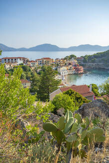 Elevated view of harbour and colourful houses in Assos, Assos, Kefalonia, Ionian Islands, Greek Islands, Greece, Europe - RHPLF28756
