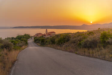 View of Holy Monastery of the Most Holy Theotokos of Sissia near Lourdata at sunset, Kefalonia, Ionian Islands, Greek Islands, Greece, Europe - RHPLF28798