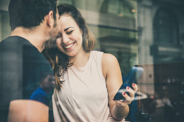 Couple of lovers drinking coffee in a coffehouse bar - DMDF07422