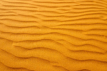 Closeup rippled sand surface on dune in arid desert - ADSF48168