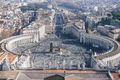 From above aerial view of piazza San Pietro a plaza square located in front of St. Peter's Basilica in the Vatican City in Rome, Italy - ADSF48178