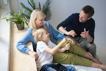 Happy family enjoying together at home - JOSEF21529