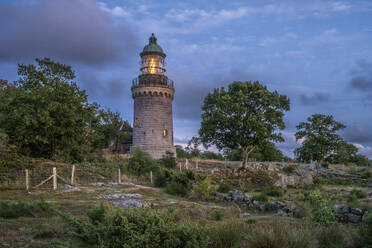 Denmark, Bornholm, Hammeren Lighthouse at dusk - KEBF02751