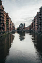 Canal amidst Speicherstadt in Hamburg, Germany - MMPF00997