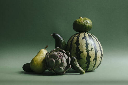 Green fruits and vegetables against green background - JUBF00447