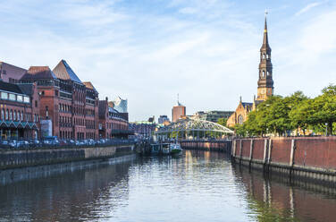 Speicherstadt canal near St. Catherine Church in Hamburg, Germany - IHF01824