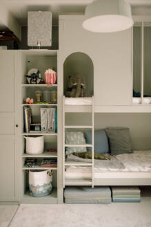 Bunkbed with toys in rack at home - MASF40306