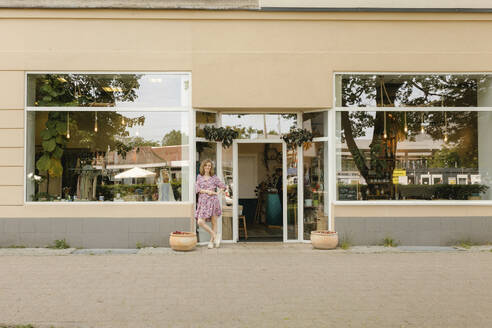 Owner standing outside zero waster store - VIVF01205