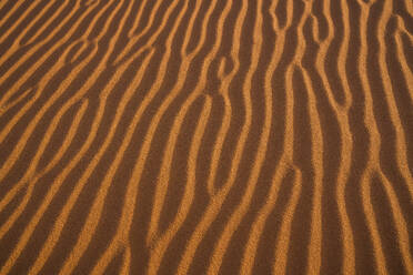 Aerial View of sand dunes at sunset in the Sahara desert, Djanet, Algeria, Africa. - AAEF22973