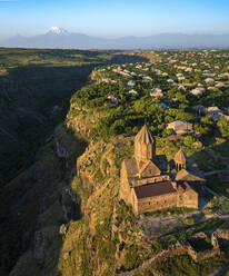 Aerial view of Hovhannavank, a medieval monastery along the Kasagh River canyon in the village of Ohanavan in the Aragatsotn Province of Armenia. - AAEF22983