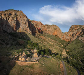 Aerial view of Noravank Monastery, an orthodox church with beautiful architecture among the mountains, Areni, Vayots Dzor Province, Armenia. - AAEF23005