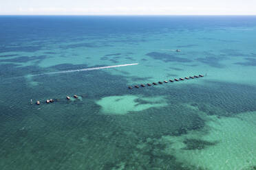 Aerial View Of Coral Reef And Turquoise Ocean Water Surrounding Glenelg Blocks In Adelaide, South Australia. - AAEF23048