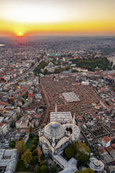 Aerial view of Nuruosmaniye Mosque and Grand Bazaar at sunset, Istanbul, Turkey. - AAEF23058