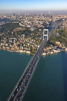 Aerial view of Fatih Sultan Mehmet bridge on the Bosphorus, Istanbul, Turkey. - AAEF23075