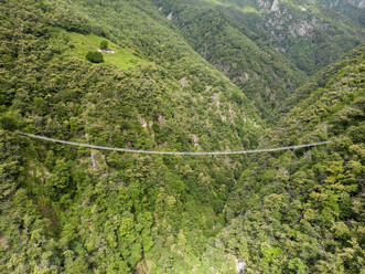Aerial View of suspension bridge (Ponte Tibetano), Bellinzona, Canton Ticino, Switzerland. - AAEF23112