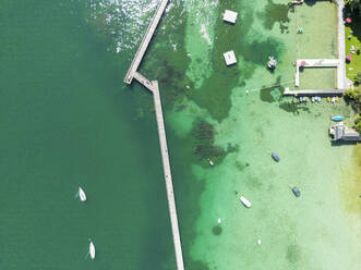 Aerial View of Cassiopeia Pier with boat docked along the coast, Lake Zurich, Zurich, Switzerland. - AAEF23115