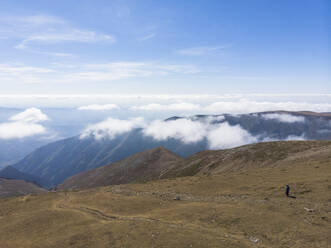 Aerial Drone View of Sunny Mountain with Clouds at Botev Peak, Vasil Levski, Plovdiv, Bulgaria. - AAEF23197