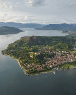 Aerial view of Angera, a small town along Lago Maggiore (Lake Maggiore) at sunset, Lombardy, Italy. - AAEF23329