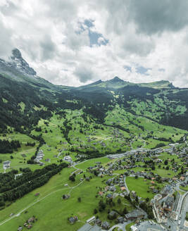 Aerial view of Grindelwald, a village on Bernese Alps in the Jungfrau region, Swiss Alps, Canton of Bern, Switzerland. - AAEF23420