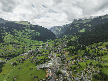 Aerial view of Grindelwald, a village on Bernese Alps in the Jungfrau region, Swiss Alps, Canton of Bern, Switzerland. - AAEF23429