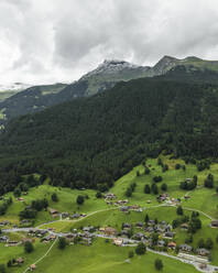 Aerial view of Grindelwald, a village on Bernese Alps in the Jungfrau region, Swiss Alps, Canton of Bern, Switzerland. - AAEF23432
