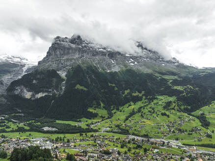 Aerial view of Bernese Alps in Grindelwald town in summertime, Swiss Alps, Canton of Bern, Switzerland. - AAEF23443