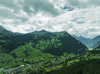 Aerial view of Bernese Alps in Grindelwald town in summertime, Swiss Alps, Canton of Bern, Switzerland. - AAEF23444