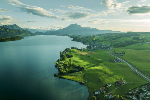 Aerial view of Mount Pilatus at sunset from Lake Lucerne, a mountain peak in Alpnach, Switzerland. - AAEF23449