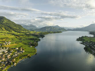 Aerial view of Lake Lucerne at sunset, from Kussnacht am Rigi with Burgenstock mountain peak in background, Schwyz, Switzerland. - AAEF23455