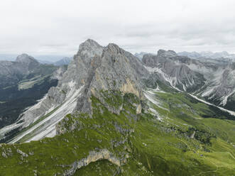 Aerial view of Seceda, a popular mountain peak on the Dolomites in the Odle/Geisler Group situated within Puez-Odle Nature Park in South Tyrol in Northern Italy. - AAEF23519