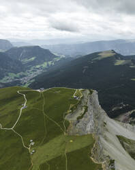 Aerial view of a beautiful mountain landscape from Seceda mountain peak and ridge, Puez-Odle Nature Park in Trentino, South Tyrol, Italy. - AAEF23523