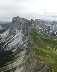 Aerial view of Seceda, a popular mountain peak on the Dolomites in the Odle/Geisler Group situated within Puez-Odle Nature Park in South Tyrol in Northern Italy. - AAEF23524