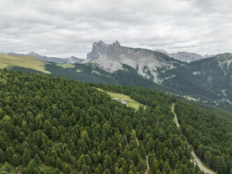 Aerial view of Seceda, a popular mountain peak on the Dolomites in the Odle/Geisler Group situated within Puez-Odle Nature Park in South Tyrol in Northern Italy. - AAEF23531