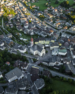 Aerial view of Ortisei, a small village on the Dolomites mountains at sunset, Trentino, South Tyrol in Northern Italy. - AAEF23534