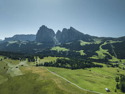 Aerial view of Sassolungo (Langkofel), a mountain peak on the Dolomites from Alpe di Siusi (Seiser Alm) in Trentino, South Tyrol in Northern Italy. - AAEF23555