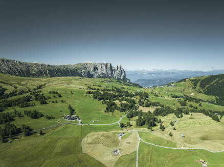 Aerial view of Sciliar Catinaccio Natural Park in Alpe di Siusi (Seiser Alm) in Trentino, South Tyrol in Northern Italy. - AAEF23560