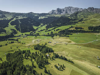 Aerial view of Alpe di Siusi (Seiser Alm) on the Dolomites mountains, Trentino, South Tyrol in Northern Italy. - AAEF23563