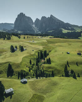 Aerial view of Sassolungo (Langkofel), a mountain peak on the Dolomites from Alpe di Siusi (Seiser Alm) in Trentino, South Tyrol in Northern Italy. - AAEF23576