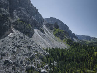 Aerial view of Sassolungo (Langkofel), a mountain peak on the Dolomites mountain range in Trentino, South Tyrol in Northern Italy. - AAEF23584