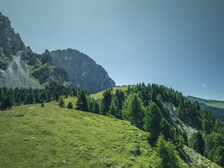 Aerial view of Sassopiatto (Plattkofel), a mountain peak on the Dolomites mountain range in Trentino, South Tyrol in Northern Italy. - AAEF23592