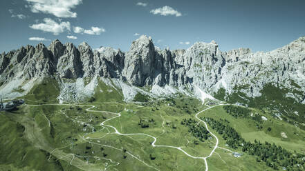 Aerial view of Pines de Cir (Cirspitzen) mountain on Passo Gardena on the Dolomites Mountains, Trentino, South Tyrol, Italy. - AAEF23601